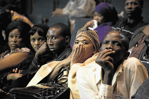 Family members of some of the deceased Marikana mineworkers could not hide their disbelief during a sitting of the Farlam Commission of Inquiry at the Rustenburg Civic Centre as they watched TV footage of striking miners being gunned down by police.