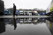 Lorries are parked up at Clacket Lane service area, as EU countries impose a travel ban from the UK after the Covid-19 outbreak, in Westerham, Britain on December 21 2020. 