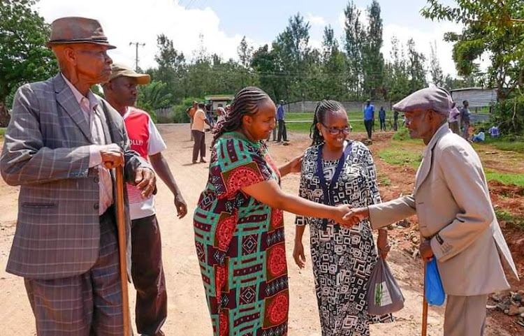 Aldai MP Marianne Keitany meets residents of her constituency during a tour of the area to oversee development projects.