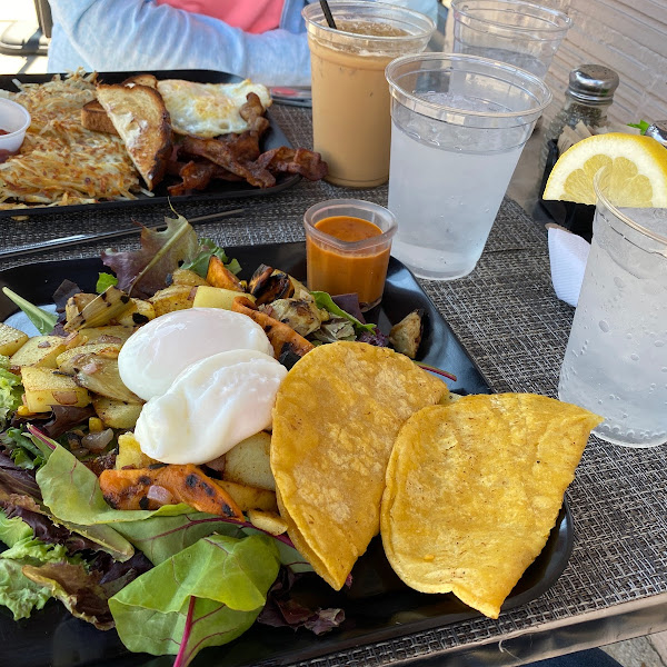 veggie hash with corn tortillas, eggs, bacon and potatoes hash