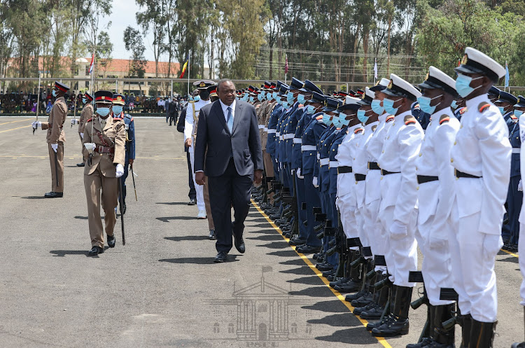 President Kenyatta inspects the commissioning parade of intake 40 Graduate General Service Officer Cadets at the Kenya Military Academy in Lanet, Nakuru County