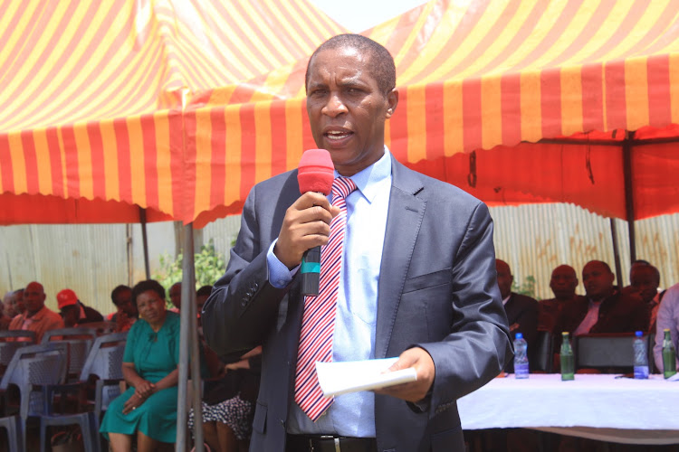 Gatanga MP Joseph Nduati at Gatanga primary school during issuance of Sh25 million bursaries at Gatanga Primary School