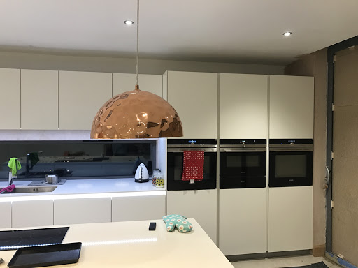 New Electrical supply and lighting to extension, Down lights and attractive copper hanging pendant lighting to illuminate kitchen. The client purchased metal letters LOL and we installed lamps to each letter making the attractive sign as seen in the photo.