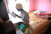 Siphosethu Kwayimani, 16, at home  in Soweto during the lockdown.  / ANTONIO MUCHAVE