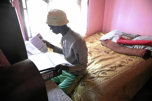 Siphosethu Kwayimani, 16, at home in Soweto during the lockdown. / ANTONIO MUCHAVE