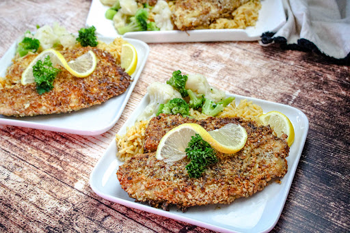 Almond Crusted Tilapia on a plate ready to serve.