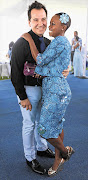 Newly engaged radio DJ Elana Afrika and Ian Bredenkamp at the L'Ormarins Queen's Plate horse race at Kenilworth racecourse, in Cape Town.