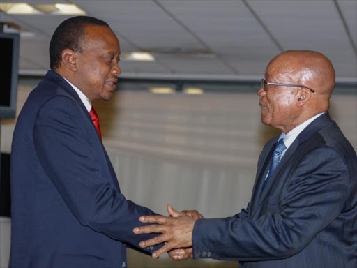 A file photo of President Uhuru Kenyatta with South Africa's Jacob Zuma. /PSCU