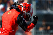 Charles Leclerc celebrates in parc ferme after clinching pole position for the F1 Grand Prix of Miami at the Miami International Autodrome on May 07, 2022 in Miami, Florida.