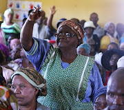 Nobakhe Mila speaks at a land claim meeting in Upper Mngqesha, KZN.