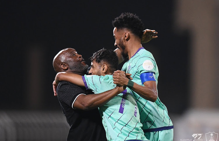 Pitso Mosimane celebrates with his players in Al-Ahli Saudi's 2-0 win against Al-Riyadh in their Yelo League game at rince Faisal bin Fahd Stadium in Riyadh, Saudi Arabia on October 16 2022.