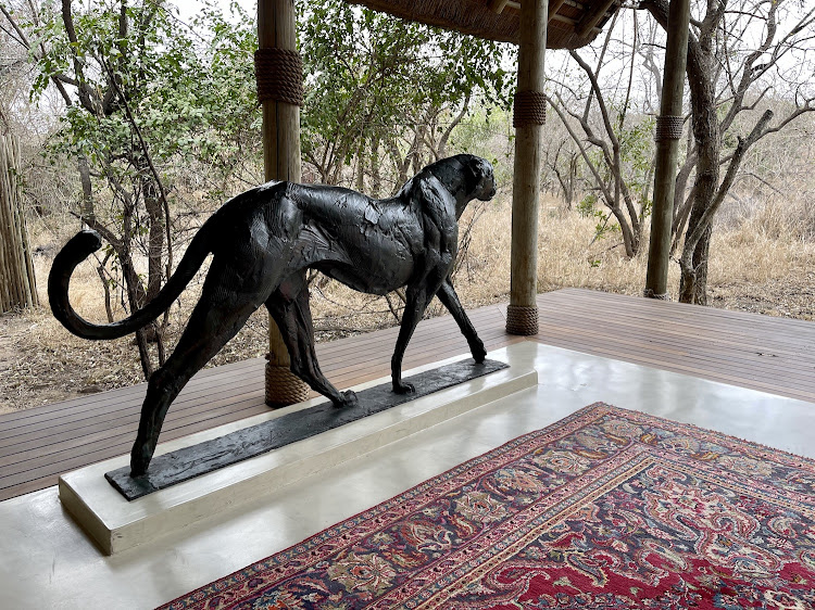 Life-sized cheetah sculpture by Dylan Lewis, at the entrance to Royale Malewane communal area.