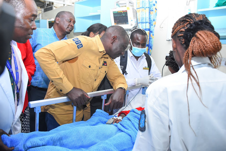 Deputy President William Ruto visited pupils admitted at Kenyatta National Hospital following Monday morning incident where seven pupils lost their lives after a classroom wall collapsed in Precious Talent Academy on Monday, 23, 2019.