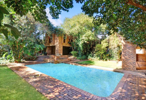 SOLD: The home of the late Dr Johnny Mosendane, which was designed by renowned architects Michael Sutton and David Walker.