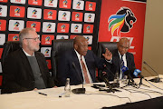 PSL head of legal division,Michael Murphy,PSL Chairperson Dr Irvin Khoza and PSL media officer and Lux September during the National Soccer League Board of Governors Press Conference at Sandton Convention Centre on July 12, 2018 in Johannesburg, South Africa. 