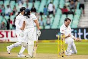 South African bowler Dale Steyn, right, celebrates after dismissing England batsman James Taylor, middle, during the first day of the cricket test at Kingsmead in Durban. Steyn's injury woes continued on Tuesday 26 January 2016 as South Africa ruled him out of the five-match one-day international series against England shortly after they secured a consolation victory in the final Test.