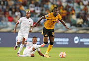 Caleb Bimenyimana of Kaizer Chiefs challenged by Trevor Mathiane of Chippa United.