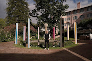 Daniel Buren in front of his installation at the Mount Nelson.