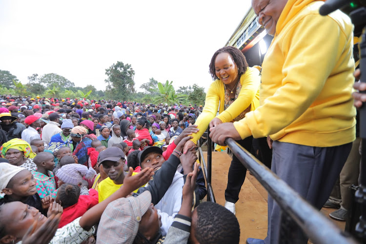 Kirinyaga Governor Anne Waiguru interacts with resident of Kiine ward during her campaign stopover.