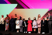 Emma Thompson, Lashana Lynch, Stephen Graham, Sindhu Vee, Alisha Weir, Ashton Robertson, Andrei Shen, Winter Jarrett Glasspool, Rei Yamauchi Fulker, Meesha Garbett, Charlie Hodson-Prior and director Matthew Warchus on stage during the BFI London Film Festival opening night gala and world premiere of 'Roald Dahl's Matilda The Musical' at London's Royal Festival Hall on Wednesday.