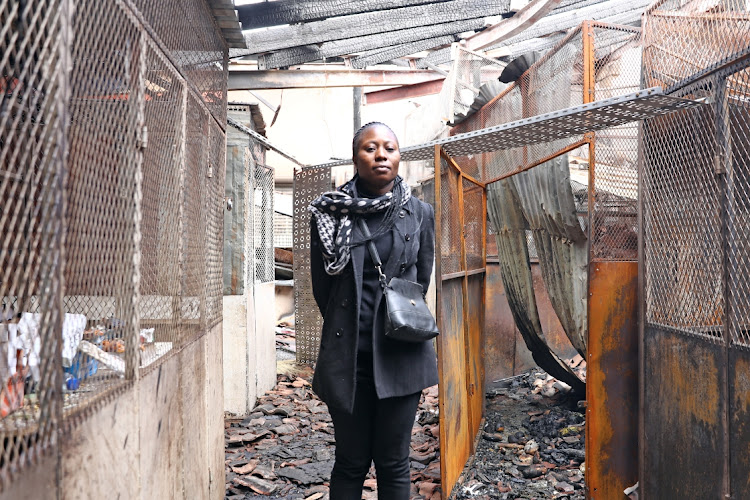 Giselle Kinzunga plead for help after she lost her stock in a fire flames that ravaged stalls in Yeoville Market.