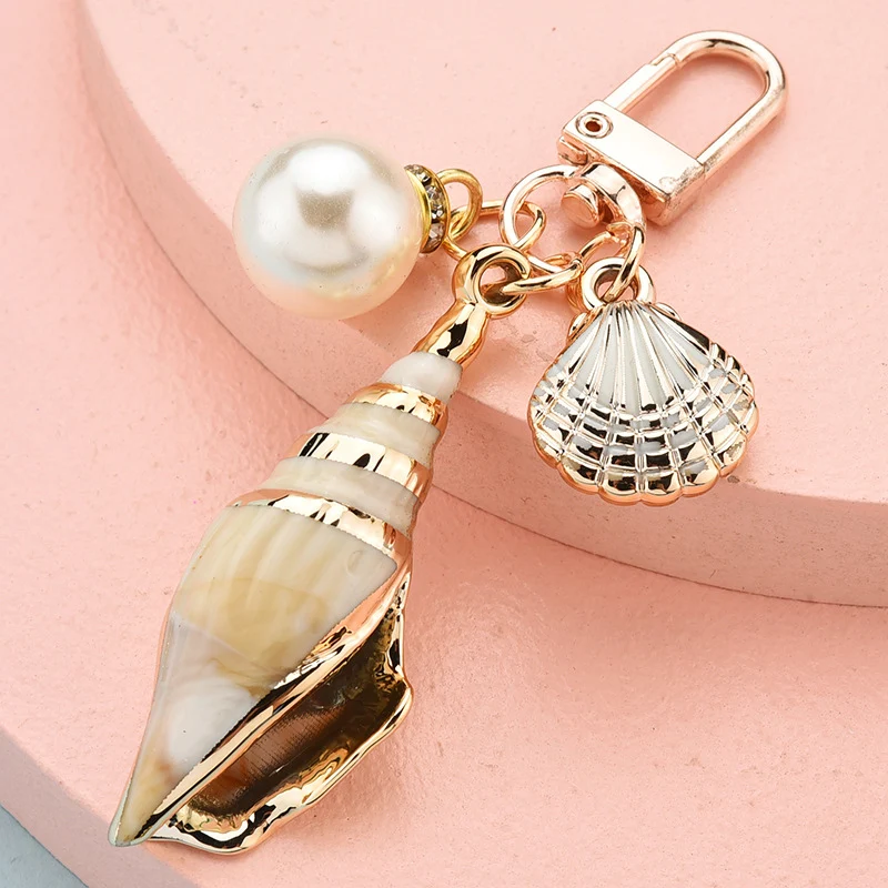 Fashionable New Cartoon Conch Tassel Key Chain, a stylish accessory for keys, bags, or backpacks, adding charm and flair