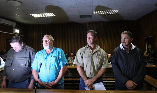 Hein Boonzaaier, Johan Hendrik Prinsloo, John Martin Keevy and Mark Trollip at the Bloemfontein Regional Court.