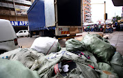 Police officers were attacked after they seized 'counterfeit' goods in downtown Johannesburg.

