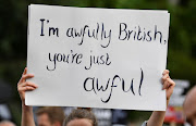 Protesters gathered outside London's Buckingham Palace during US President Donald Trump and first lady Melania Trump's state visit to Britain. 