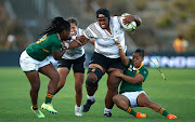 Siteri Rasolea of Fiji smashes through the South African defence during the Pool C Rugby World Cup 2021 match at Waitakere Stadium in Auckland, New Zealand on October 16 2022. 