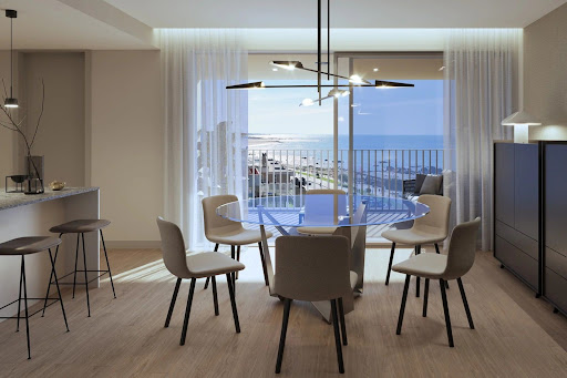 Dining room with panoramic sea view in this luxury apartment / penthouse for sale in Vila Nova de Gaia ($810,476)