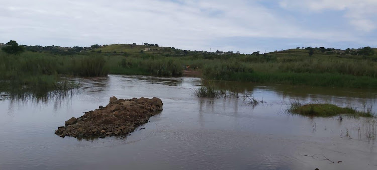 The site in the Mvoti River in KwaDukuza where a mother and baby were swept away on Monday. Their bodies were found that evening further downstream.