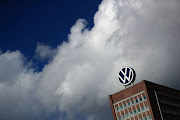 The Volkswagen AG (VW) logo sits on display at the car maker's headquarters in Wolfsburg, Germany, on Thursday, March 12, 2020. The outlook is darkening for everyone from market leader Volkswagen AG to Tesla Inc. and smaller local contenders that were already battling an unprecedented slump before the coronavirus outbreak.