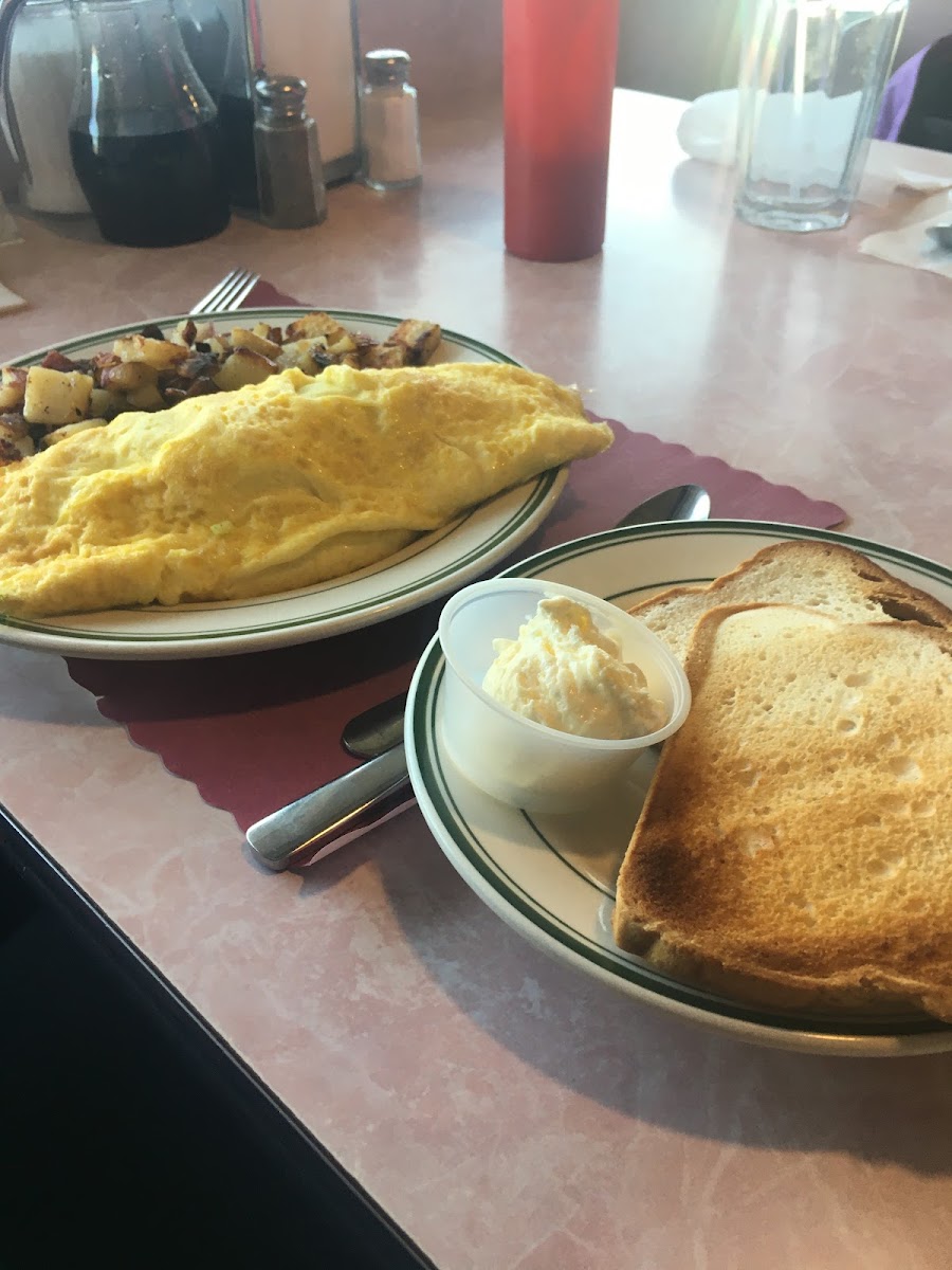 Broccoli and cheese omelette with home fries and gluten free toast