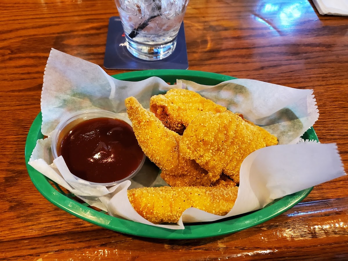 Gluten free chicken tenders with BBQ sauce.