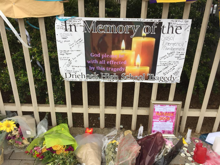 Flowers and messages from classmates at Hoërskool Driehoek mourned the pupils killed and injured in the 2019 walkway bridge collapse. File image.