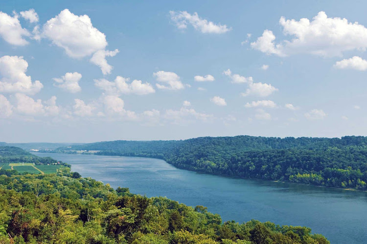 Passengers onboard the Queen of the Mississippi will appreciate the peaceful, green scenery as the ship sails on the Ohio River. 