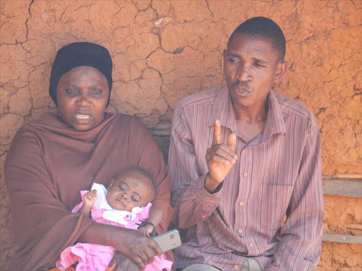 Mealii Ndundu’s parents N’kwambirwa Hamisi and Juma Hassan at their home in Kwale on Saturday.