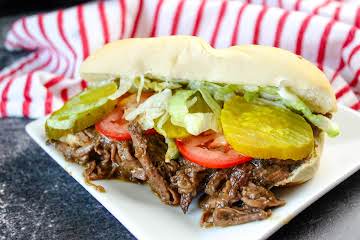 Slow Cooker Roast Beef Po' Boys With Debris Gravy