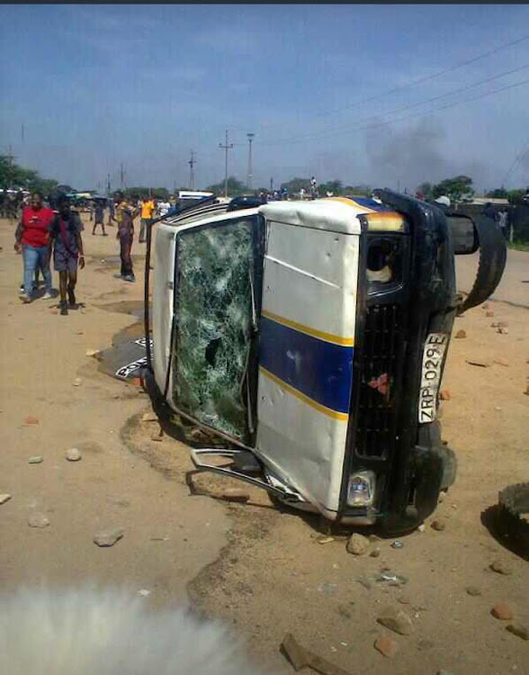 Pictures emerging on social media show some of the chaos in Bulawayo as protesters took to the streets. Police appeared to be overwhelmed. 'The people are angry. We are going back to the station because they outnumber us,' a police officer told journalists.