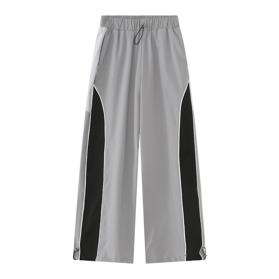 Pantaloni sportivi casual coreani, larghi a gamba larga, con vita elastica e patchwork a contrasto. Comodi e alla moda, perfetti per il tempo libero.