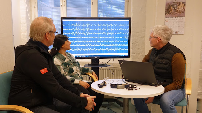 Professor Tarmo Lipping (right), lead of the Data Analytics and Optimisation research group, researcher Matin Beiram Vand (middle) and project manager Reijo Koivula are delighted with the new steps of the Mindflow project.Photo: Hanna Rissanen