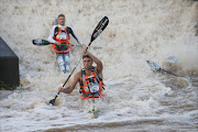 Andy Birkett shoots Ernie Pearce Weir during day 1 of the Dusi Canoe Marathon, 16 Febryuary 2017. Pic: Rogan Ward