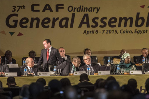 (LtoR) The President of the Federation of International Football Associations (FIFA), Joseph Sepp Blatter (L) and the President of Confederation of African Football (CAF), Issa Hayatou and Egyptian Prime Minister Ibrahim Mahlab attend the 37th CAF Ordinary General Assembly on April 7, 2015 in the Egyptian capital Cairo.