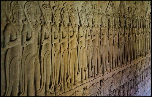 friezes-angkor-wat - Near the first level of Angkor Wat in Cambodia are huge bas-relief friezes with figures and scenes derived from Hindu traditions.