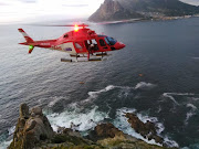 The rescue helicopter was sent to help recover the body of a woman who fell off a cliff at Chapman's Peak lookout point in Cape Town on Sunday, December 2 2018.