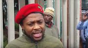 EFF spokesman Mbuyiseni Ndlozi speaking outside the Newcastle magistrate's court on 24 February 2017.