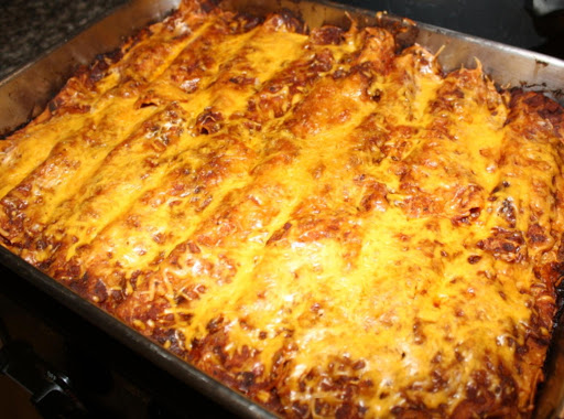 beef enchiladas in a casserole dish