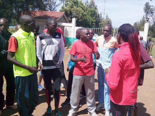 Alfred Kirwa Yego and Eunice Sum talk to the media on behalf of fellow athletes after being turned away at Moi University Training ground yesterday. /Stanley Magut