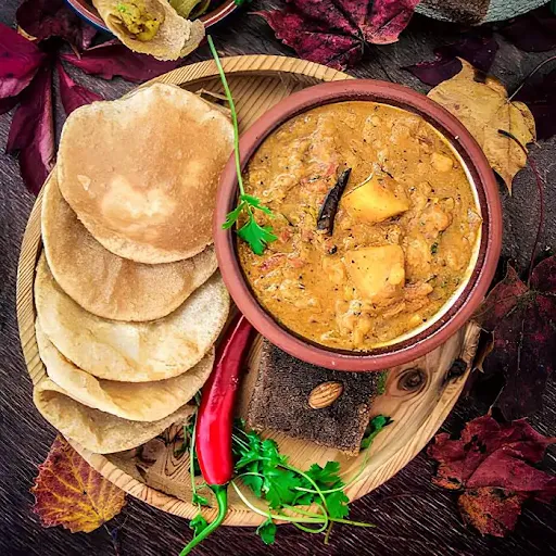 Poori (Qty 4)+ Aloo Matar Sabji